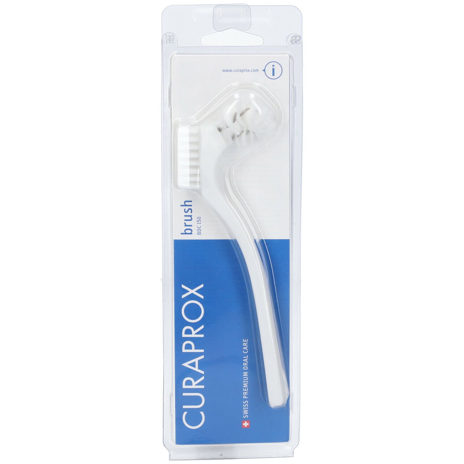 Spazzolino per protesi dentarie in confezione blister. Prodotto bianco con manico curvo. Marchio Curaprox visibile.
