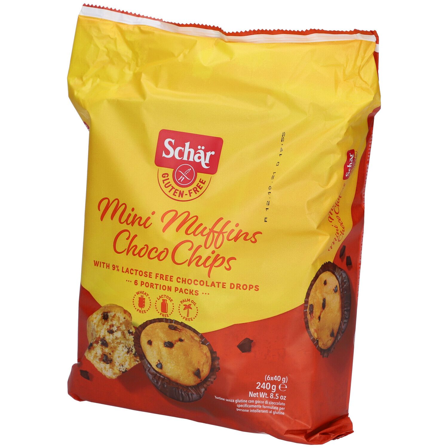 Confezione gialla Schär Mini Muffins Choco Chips. Senza glutine. 6 porzioni. Muffin con gocce di cioccolato. Vista obliqua.