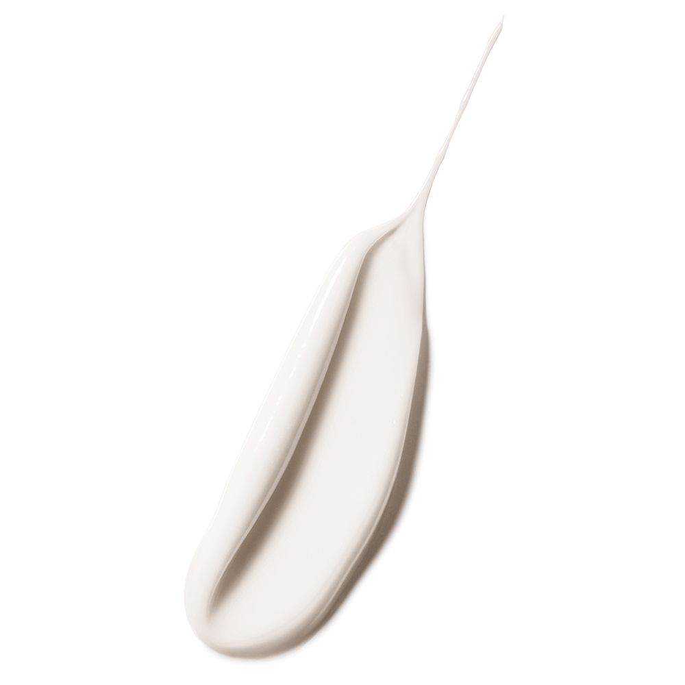 Weißes Produkt auf weißem Hintergrund. Creme-Textur, die sich ausbreitet.