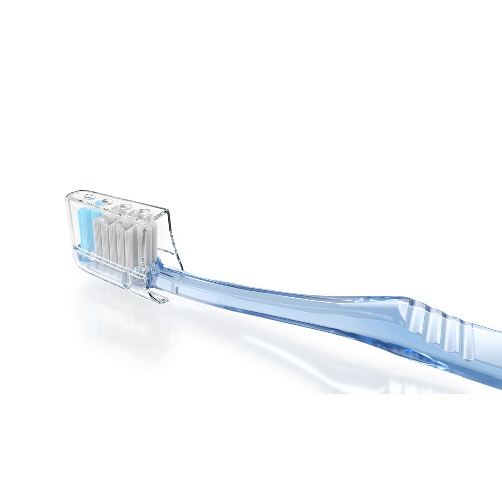 Blaue Zahnbürste mit transparentem Bürstenkopfschutz und weißen/blauen Borsten.