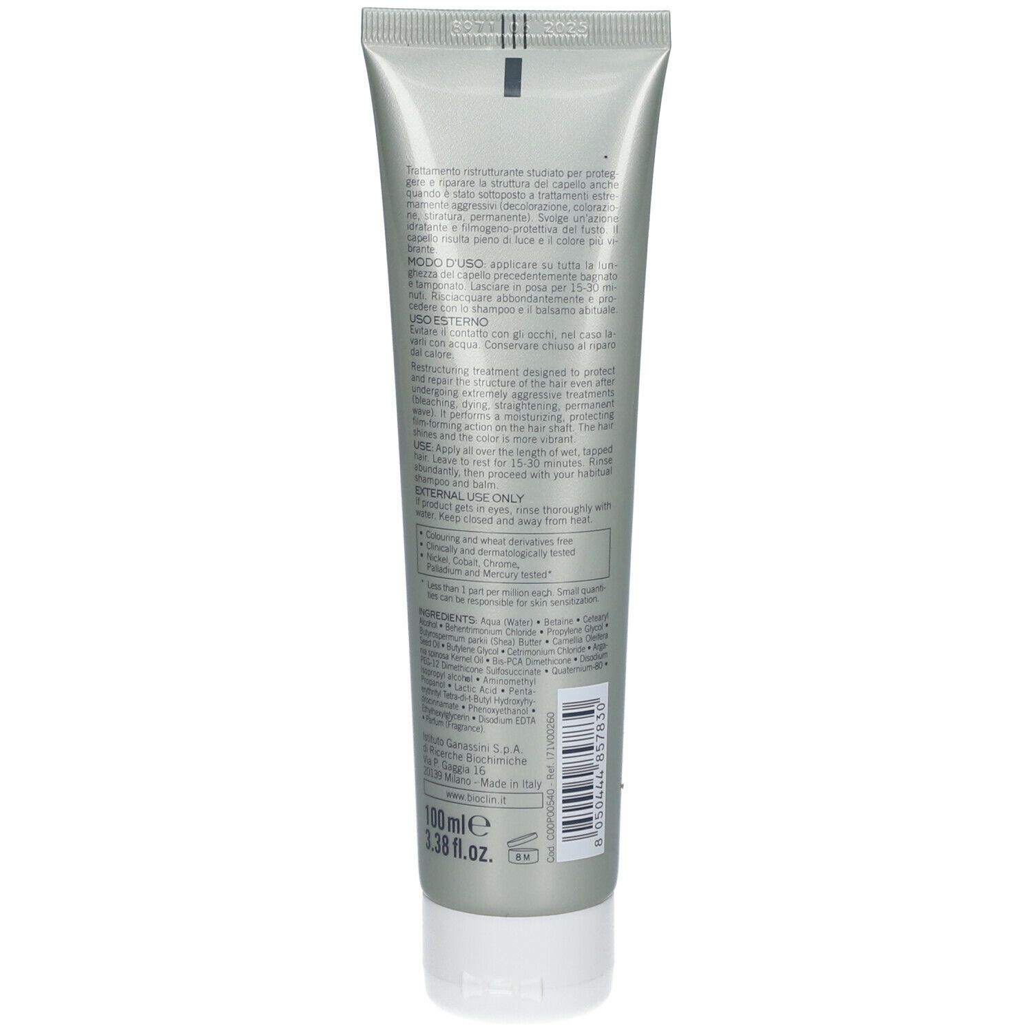 Retro di un tubo grigio. Testo: Istruzioni per l'uso, ingredienti, informazioni sul produttore, codice a barre, 100 ml.