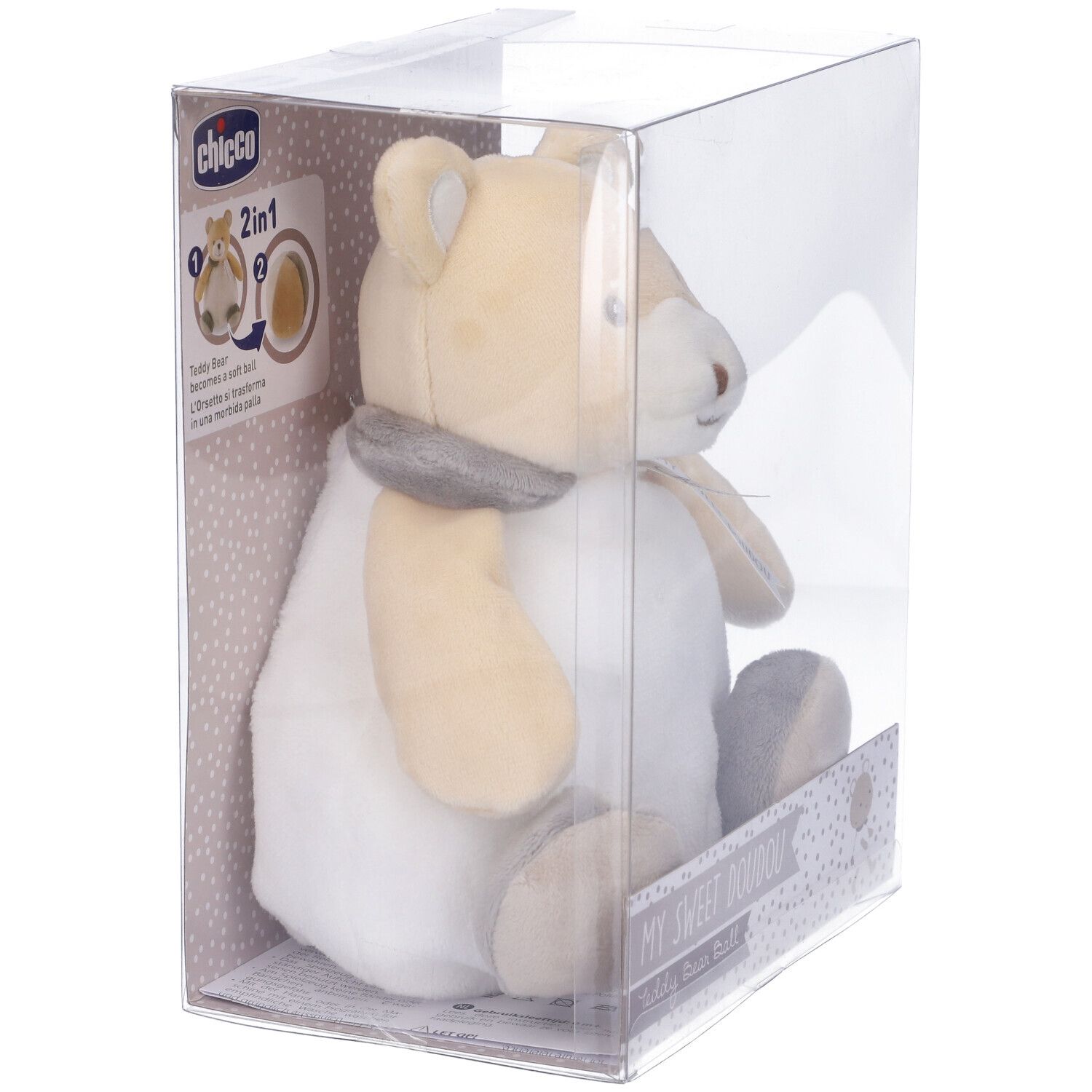 Orsetto-palla in confezione. Lato. Beige-bianco, con fiocco. Marchio Chicco. Confezione in plastica.