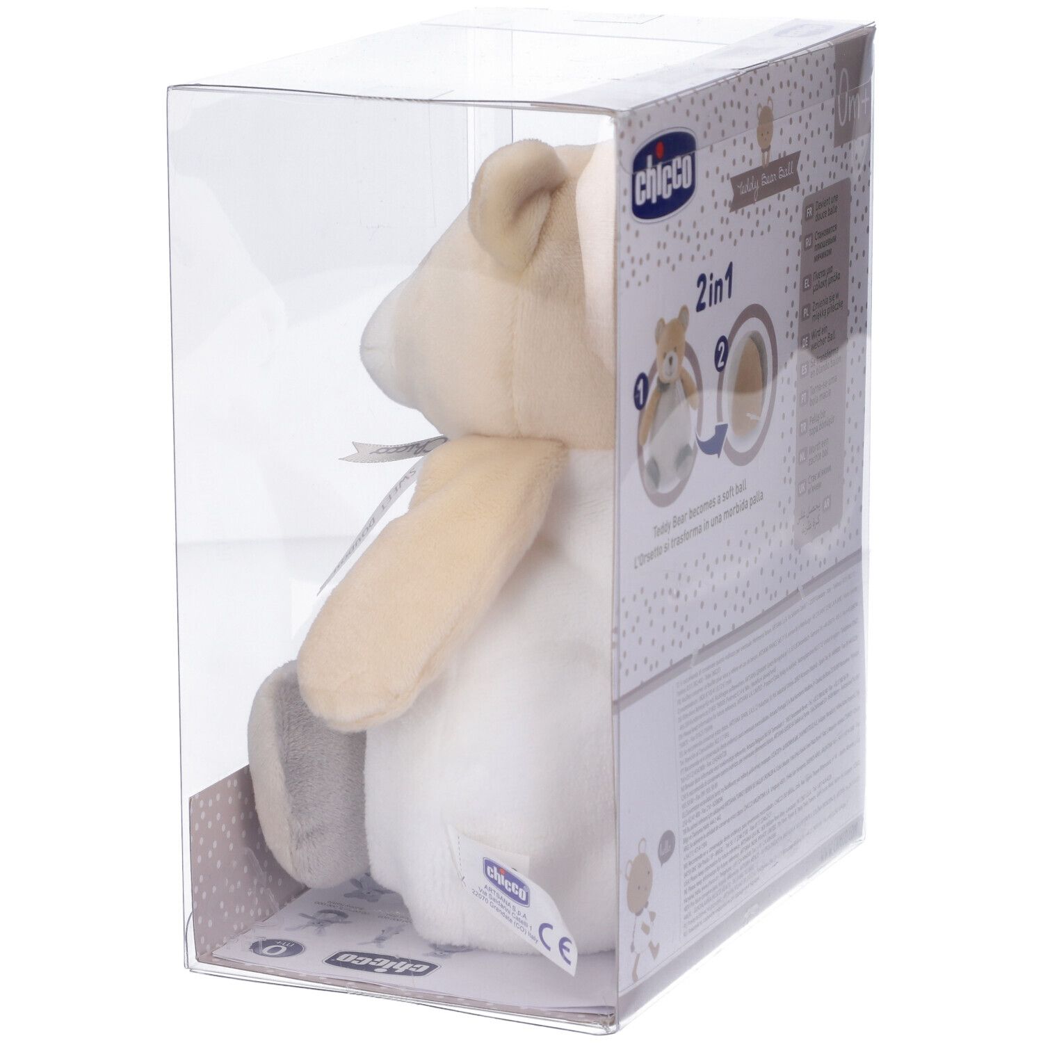 Orsetto-palla in confezione. Lato. Beige-bianco, con fiocco. Marchio Chicco. Confezione in plastica.