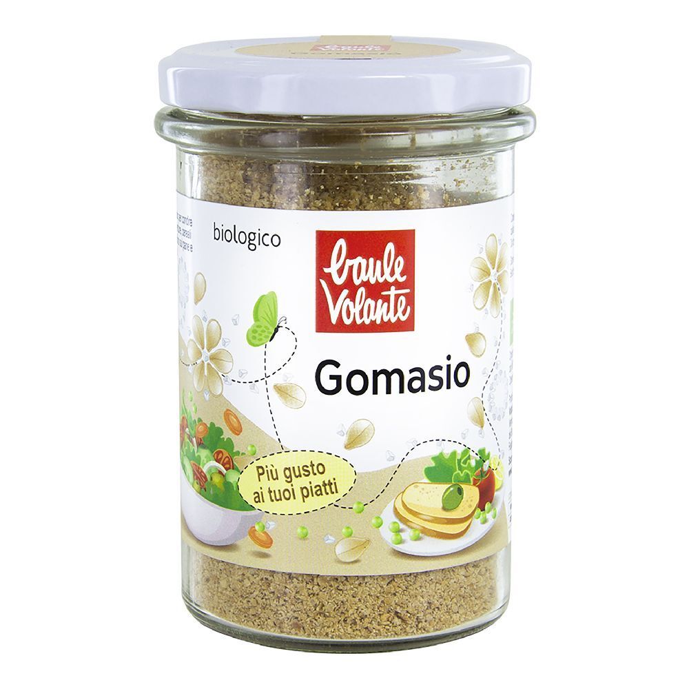 Vaso di vetro con Gomasio. Coperchio bianco, etichetta con logo e nome del prodotto. Scritta 'Più gusto ai tuoi piatti'.