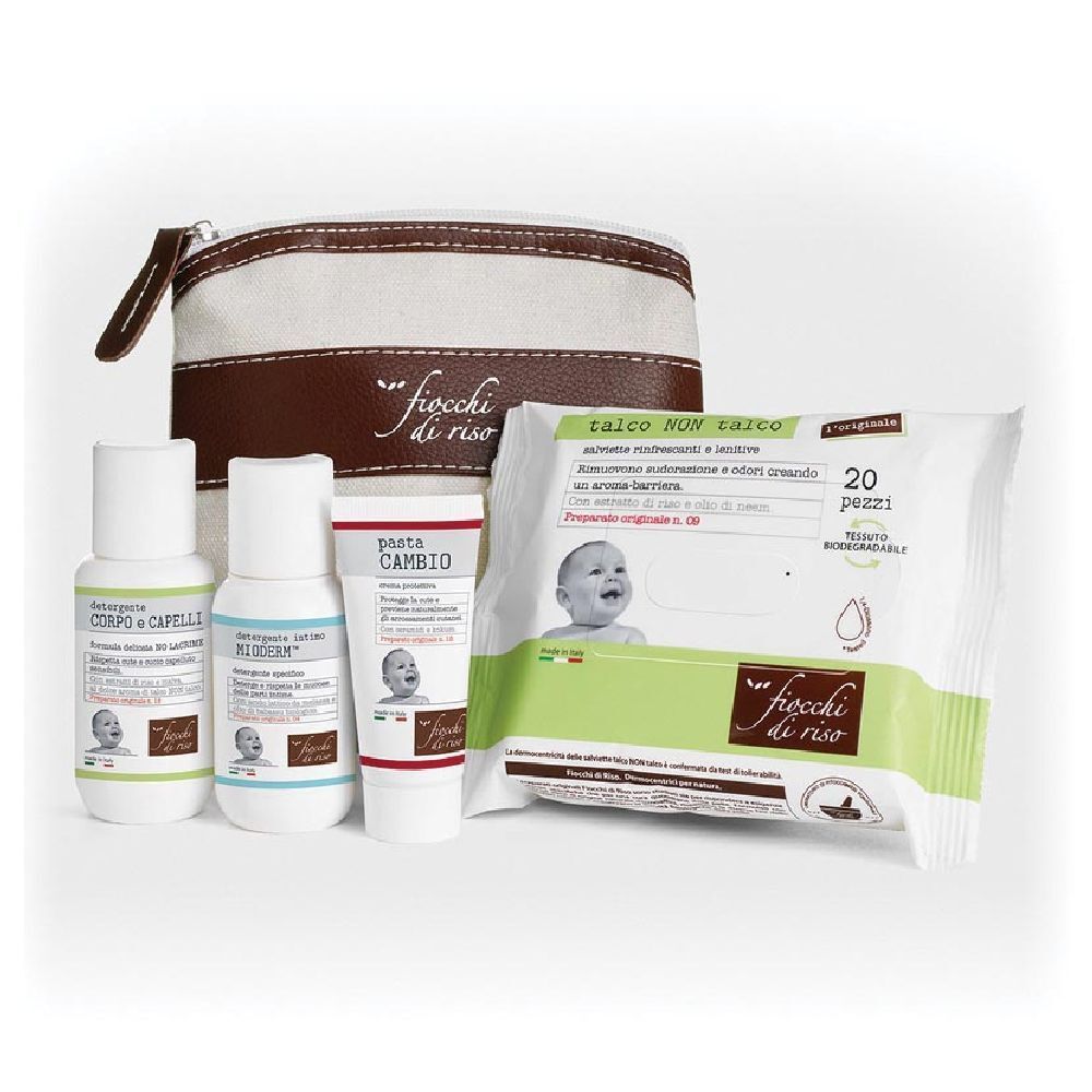 Set di prodotti per bambini. Include detergente, salviette e trousse. Scritta: Fiocchi di Riso.
