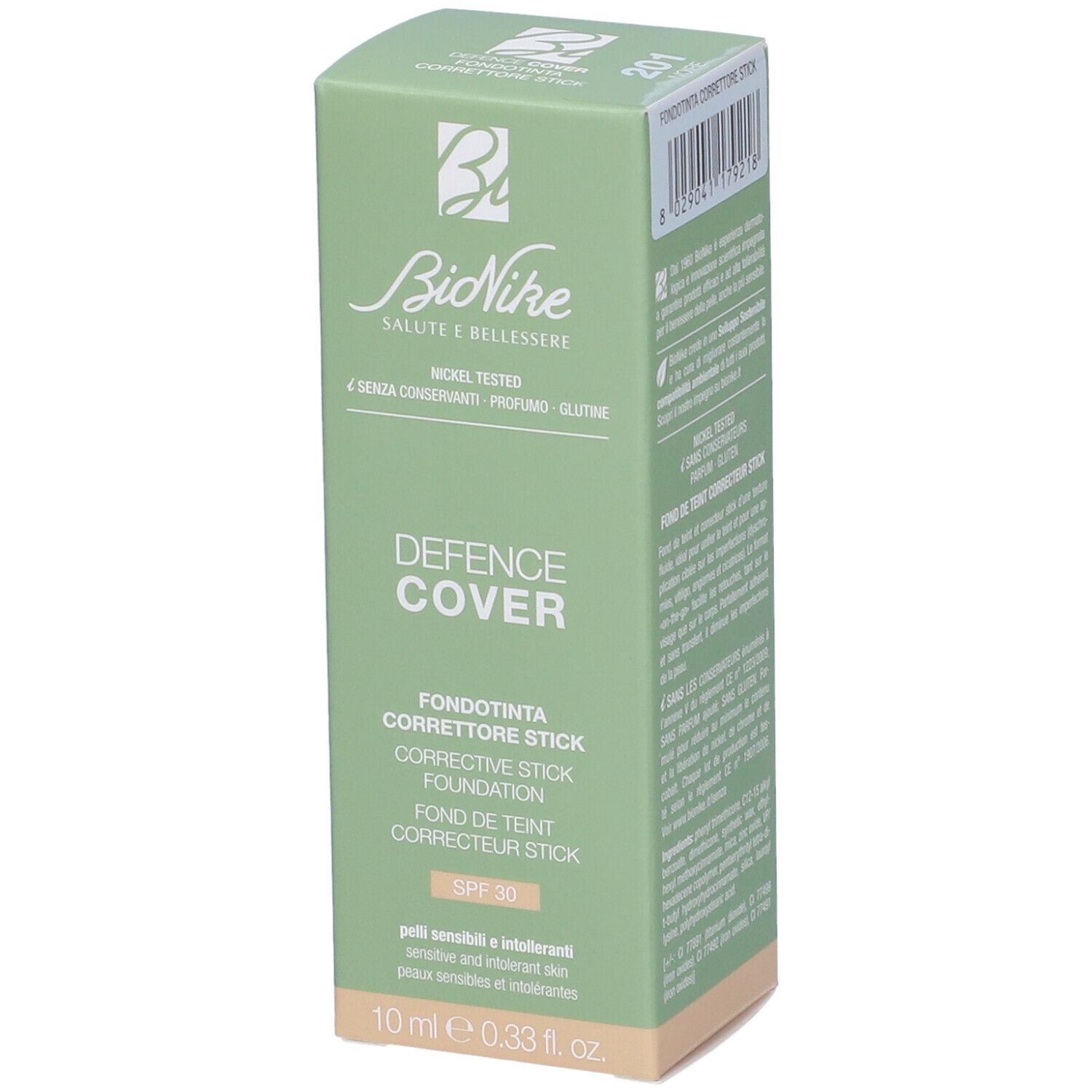 Scatola verde con informazioni prodotto. Scritta: DEFENCE COVER, SPF 30.