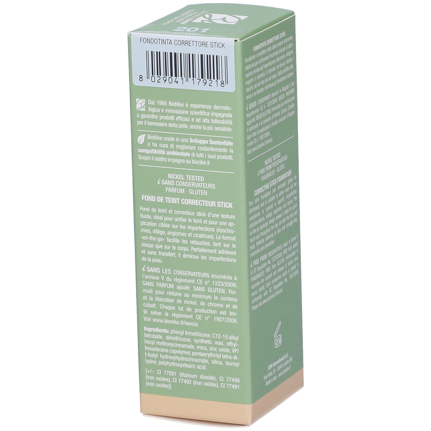 Scatola verde con testo. Scritta: Fondotinta correttore stick, 201 Ivoire.
