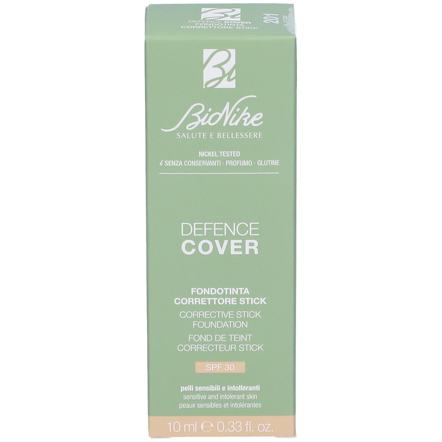 Scatola verde con informazioni prodotto. Scritta: DEFENCE COVER, SPF 30.