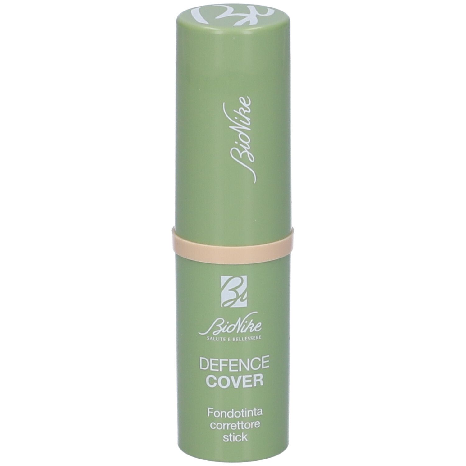 Stick verde con fascia beige. Scritta: Defence Cover, Fondotinta correttore stick.