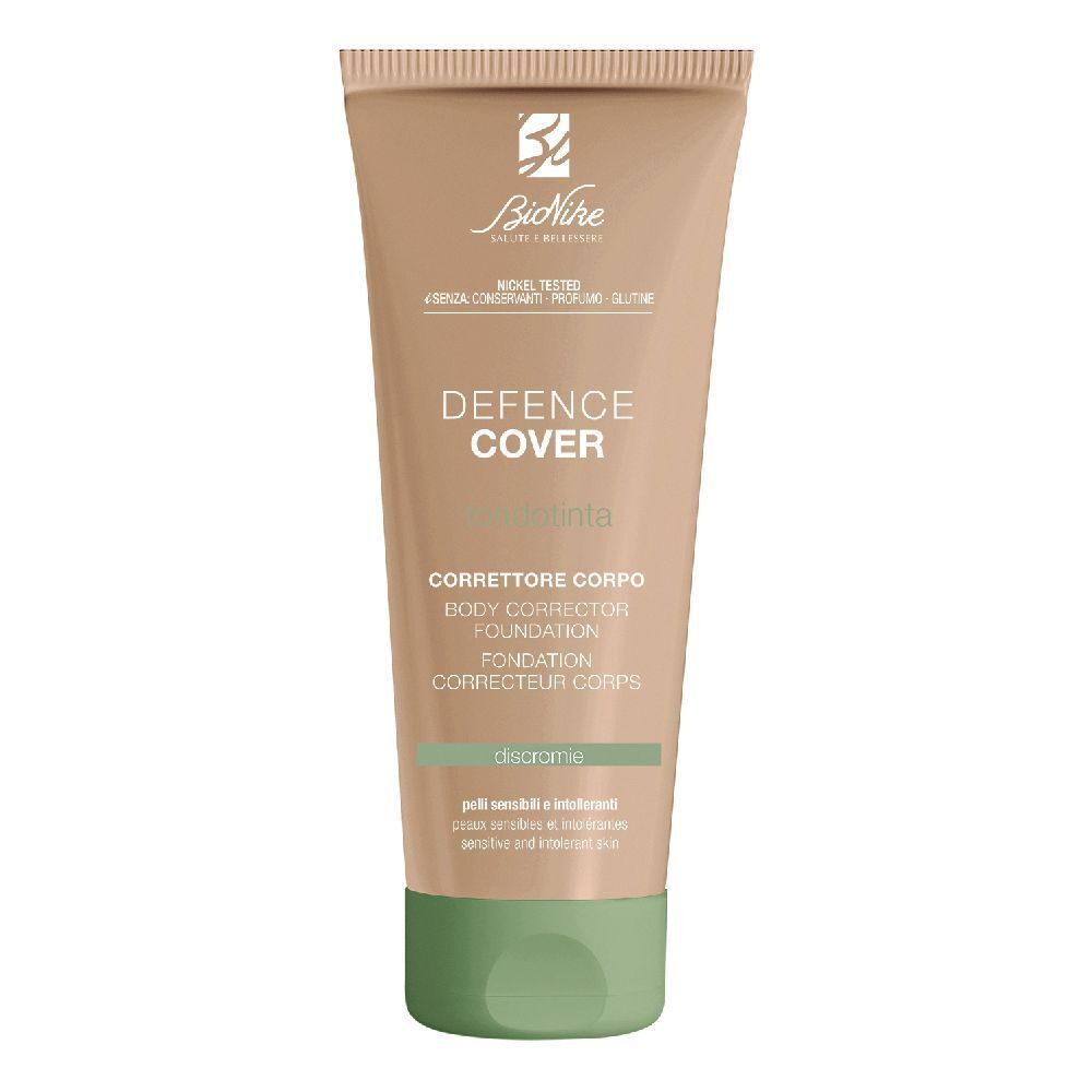 Tubo beige con tappo verde. Scritta: Defence Cover, Correttore Corpo, colore 401 Clair. Marchio Bionike.
