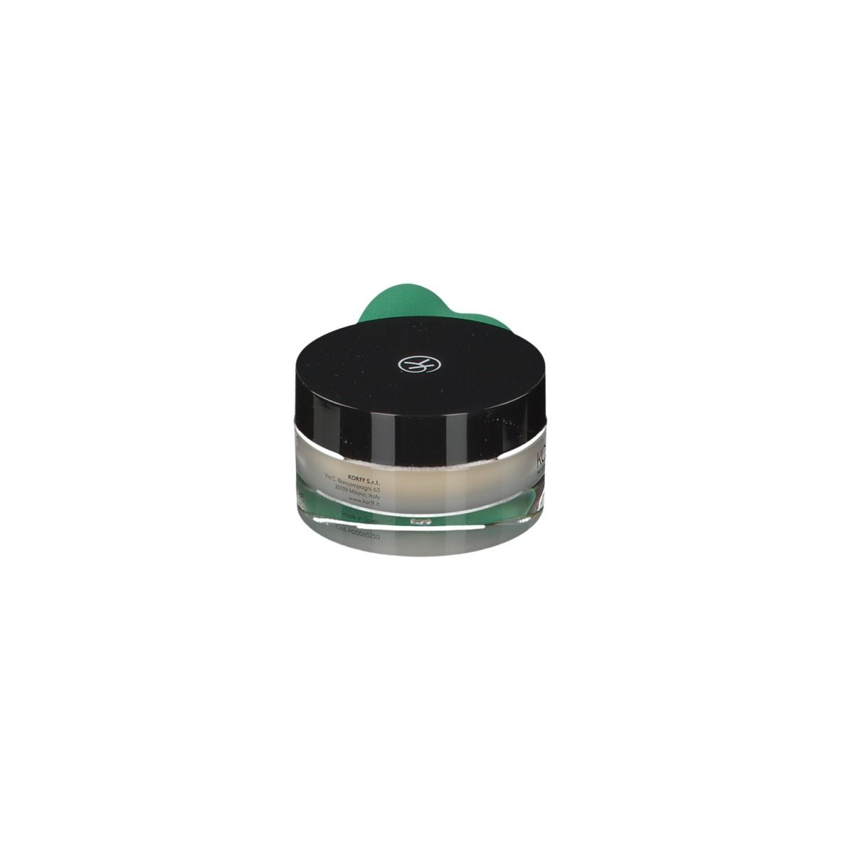 Vasetto di vetro con coperchio nero e spugna verde. Scritta: KORFF Perfect Balance.