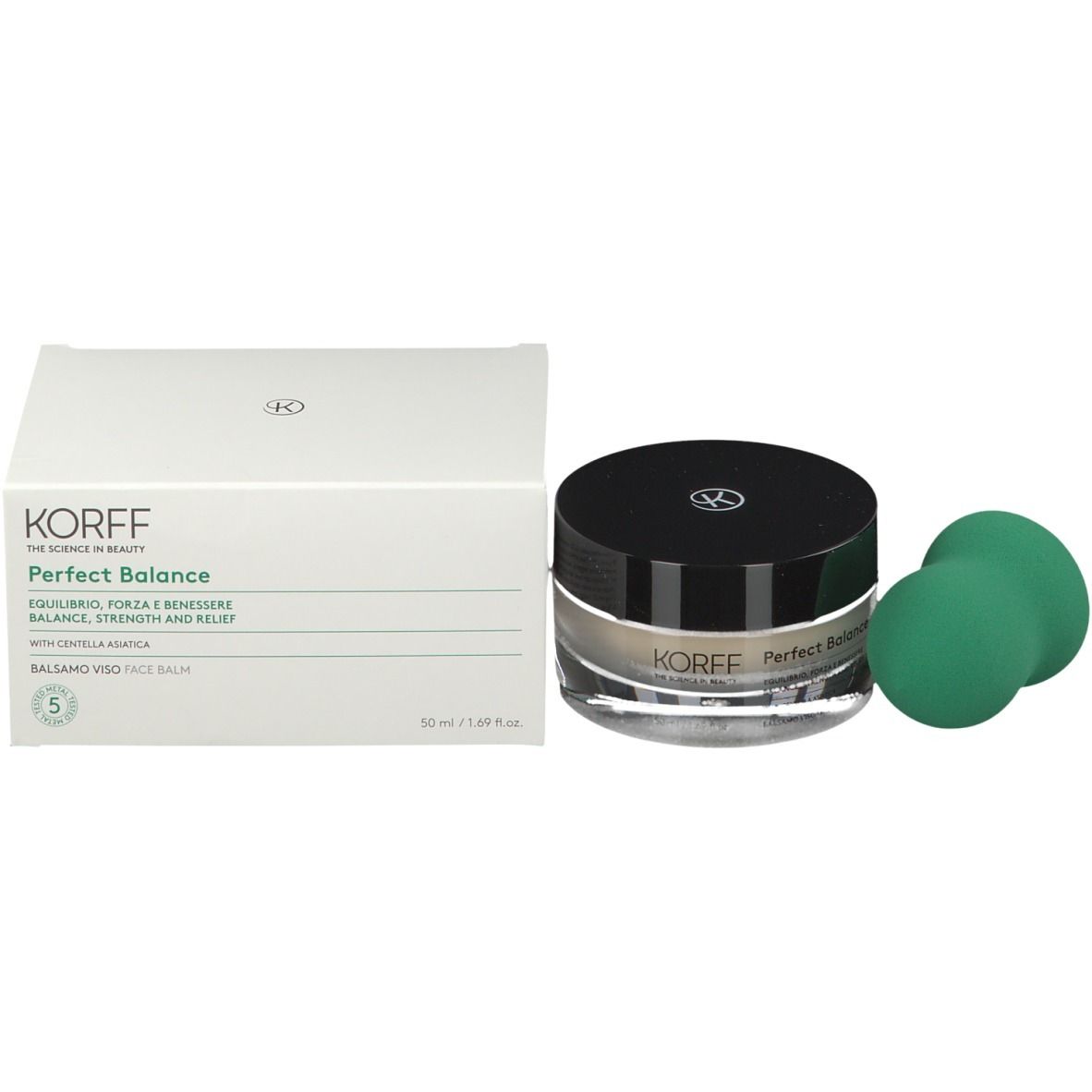 Vasetto di vetro, spugne verdi e confezione. Scritta: KORFF Perfect Balance.