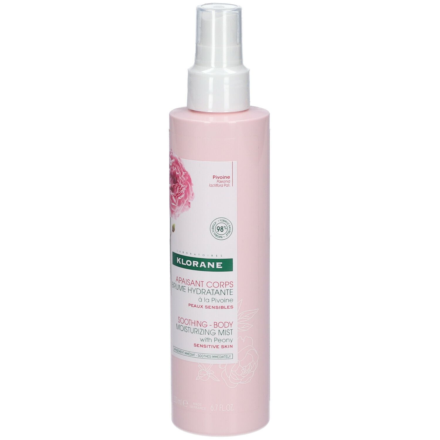 Flacone rosa con vaporizzatore. Etichetta con informazioni sul prodotto e illustrazione di peonia. Marca: KLORANE.