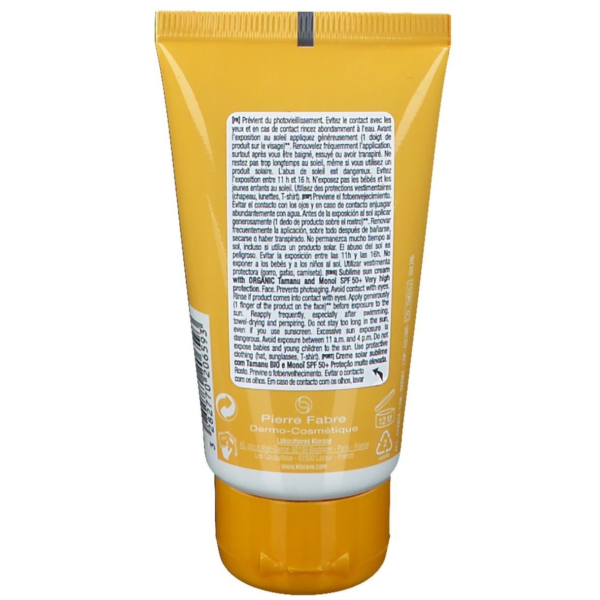 Dos d'un tube de crème solaire jaune. Texte multilingue. Logo du fabricant Pierre Fabre.