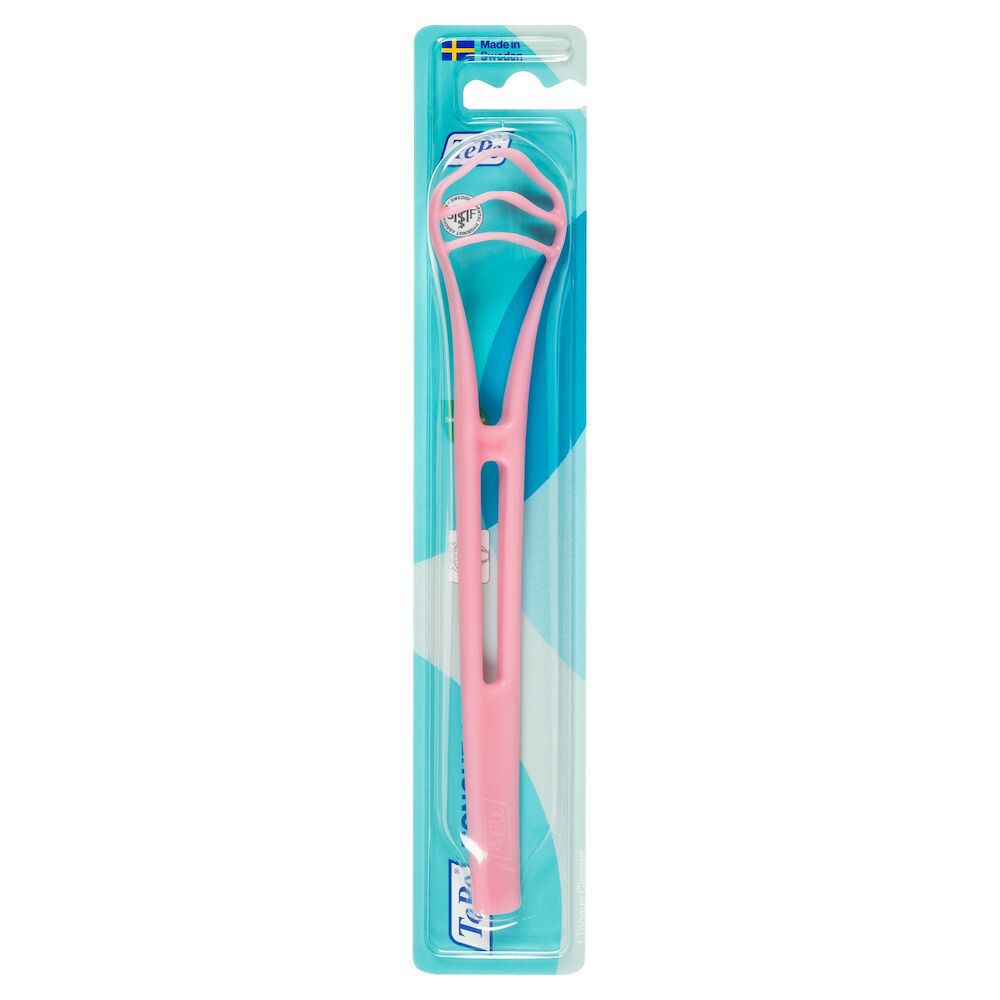 Puliscilingua rosa in confezione di plastica. L'impugnatura è rosa, il pulitore ha tre superfici.