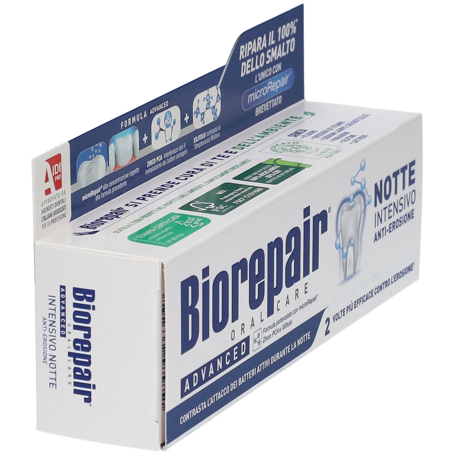 Vista obliqua della confezione di dentifricio Biorepair. Scatola bianca con coperchio blu. Nome e logo.