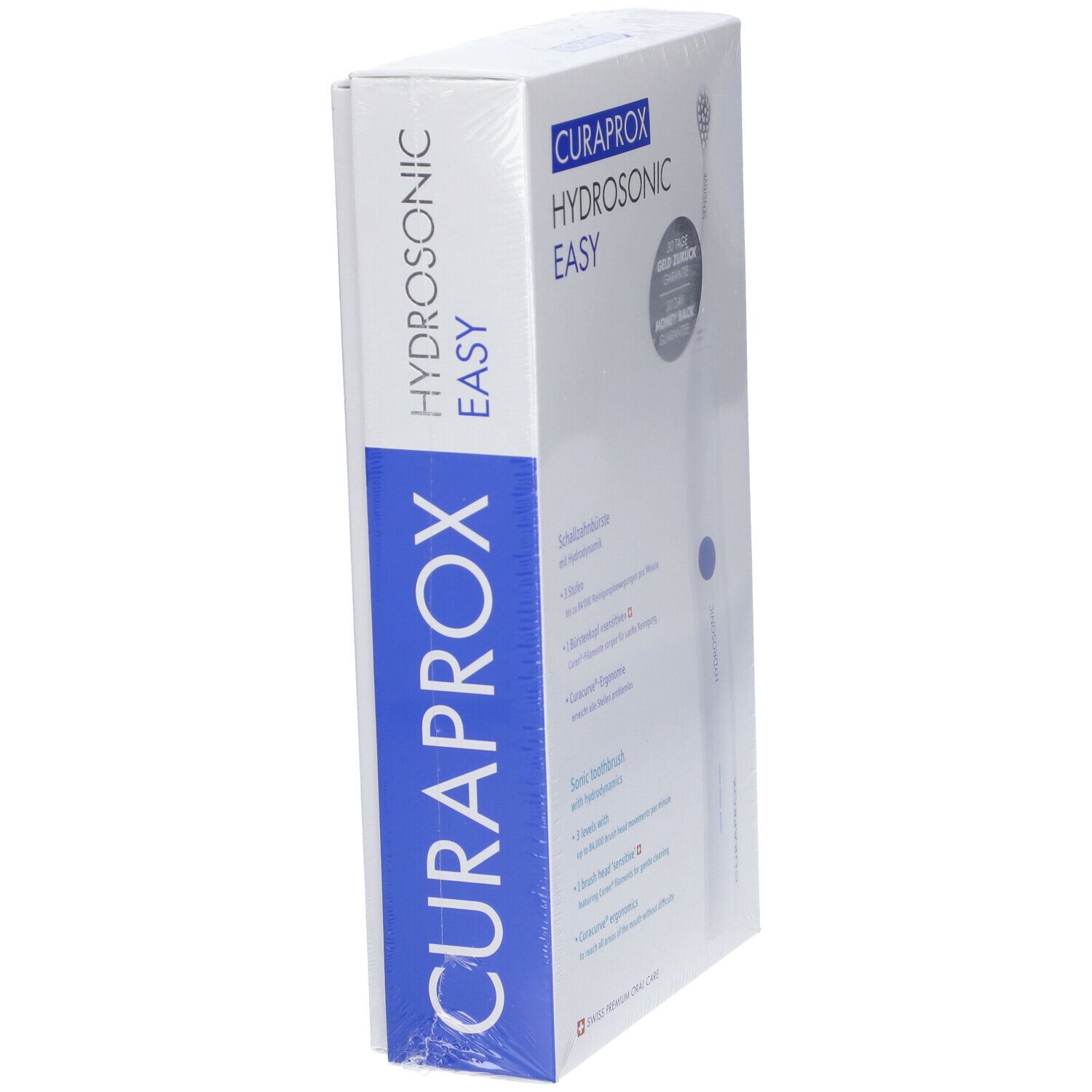 Confezione dello spazzolino sonico. Bianco e blu. Testo: CURAPROX HYDROSONIC EASY. Prodotto confezionato in plastica.