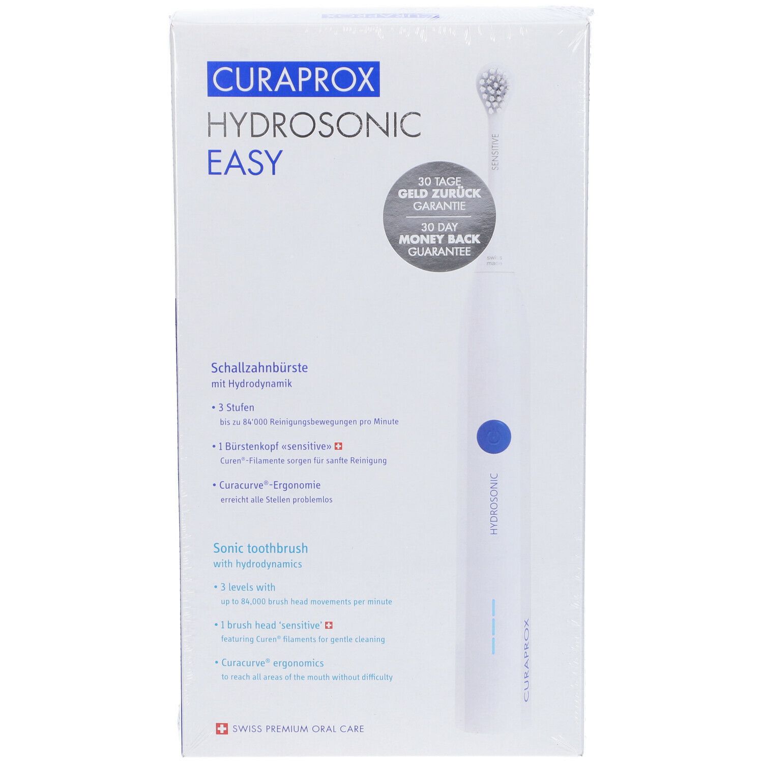 Confezione dello spazzolino sonico. Bianco. Testo: CURAPROX HYDROSONIC EASY. Prodotto e dettagli visibili. Garanzia di rimborso.