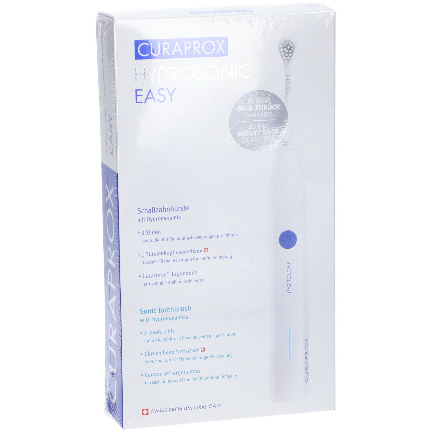 Confezione dello spazzolino sonico. Bianco. Testo: CURAPROX HYDROSONIC EASY. Prodotto e dettagli visibili. Garanzia di rimborso.