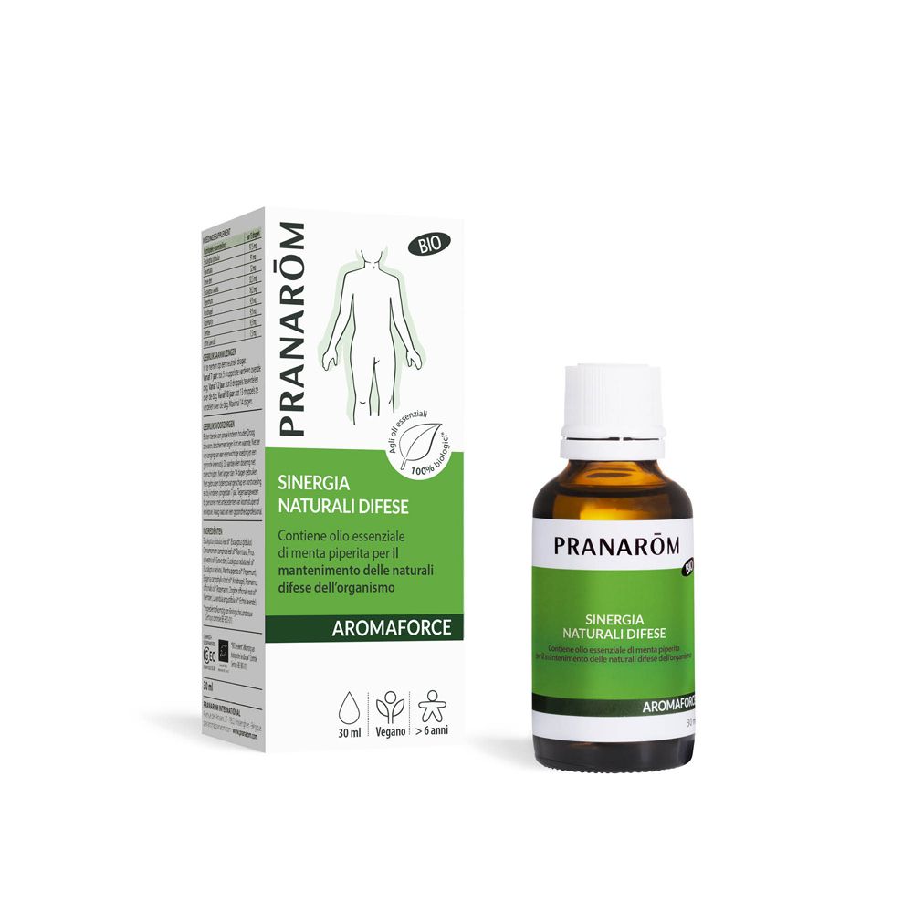 Flacone di vetro marrone con tappo bianco ed etichetta verde. Scatola bianca con informazioni sul prodotto.