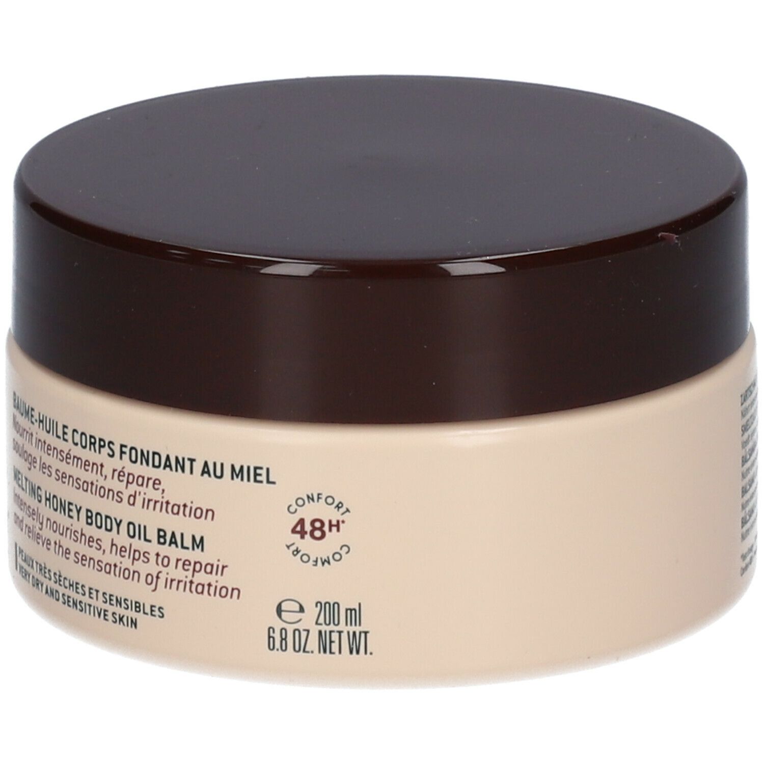 Retro del barattolo di crema. Testo in più lingue. Scritta: NUXE Rêve de Miel, Melting Honey Body Oil Balm.
