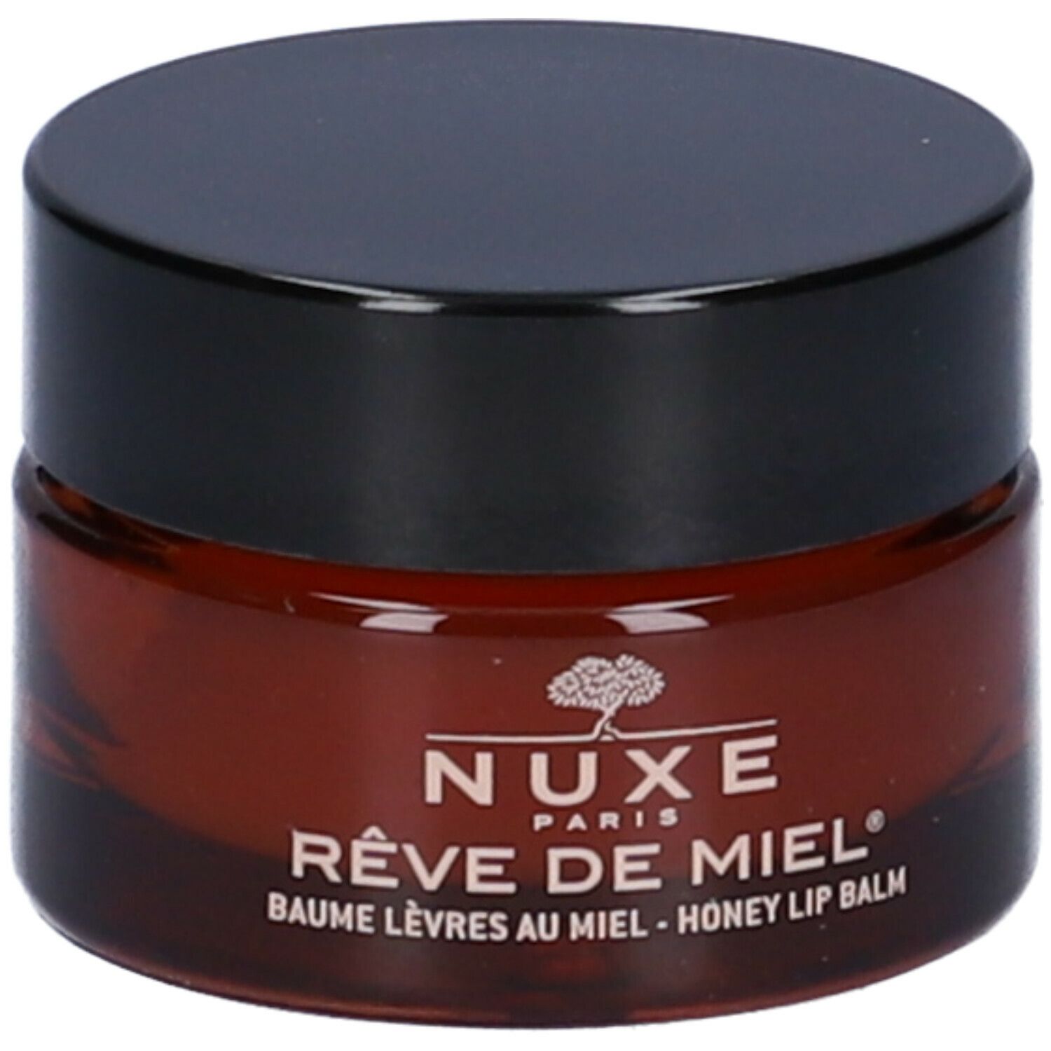 Vasetto rotondo di balsamo marrone con coperchio nero. Scritta: NUXE Rêve de Miel.