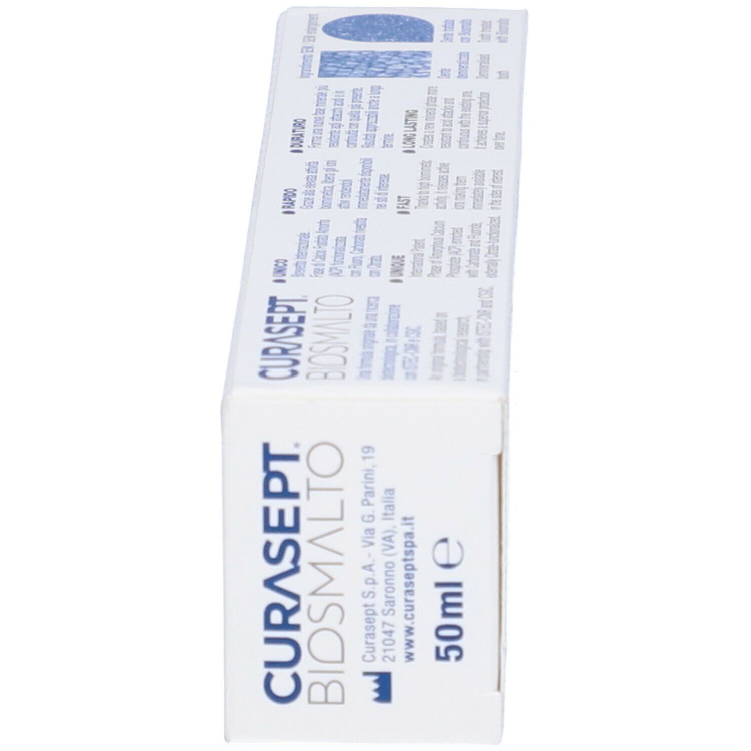 Vista laterale della scatola bianca. Nome e logo del prodotto. Testo: 50 ml e. Indirizzo e sito web.
