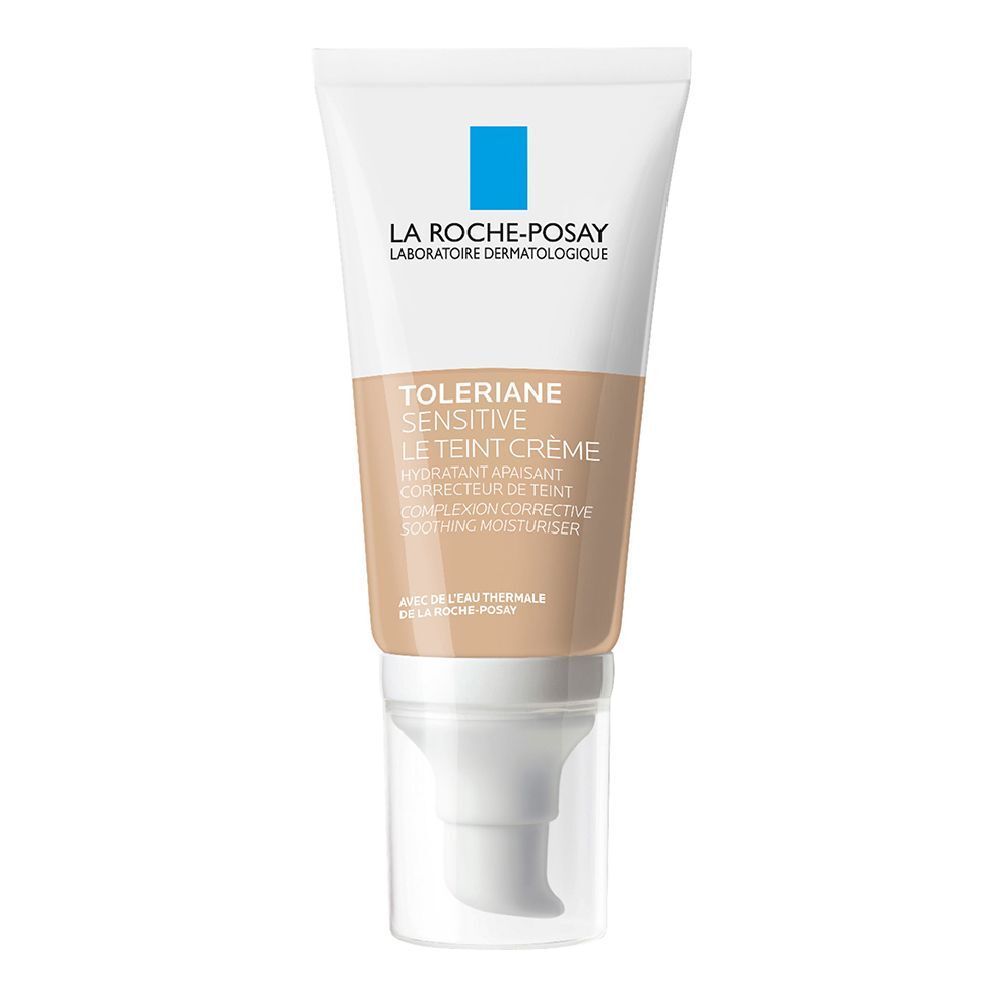 Creme-Tube mit Produktnamen und Logo. Beige Creme-Farbe. Mit Spender und transparentem Verschluss.