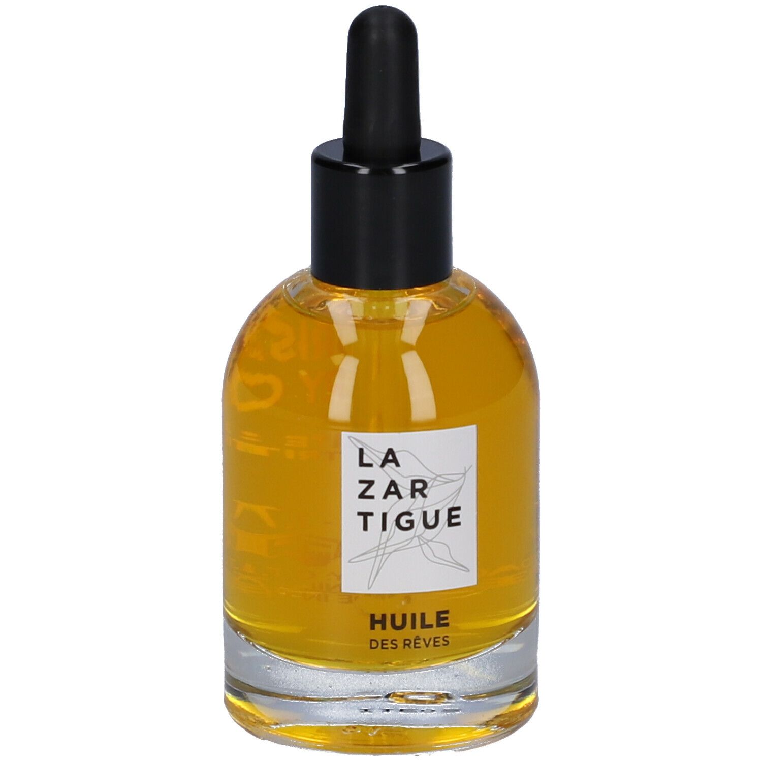Flacone in vetro con olio. Tappo nero con contagocce. Scritta: LAZARTIGUE, HUILE DES RÊVES.