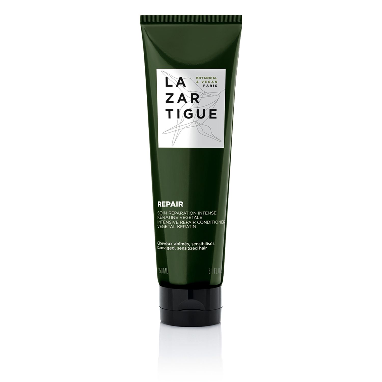 Tubo verde con tappo nero. Scritta: LAZARTIGUE REPAIR. Testo: Cheratina, per capelli danneggiati.
