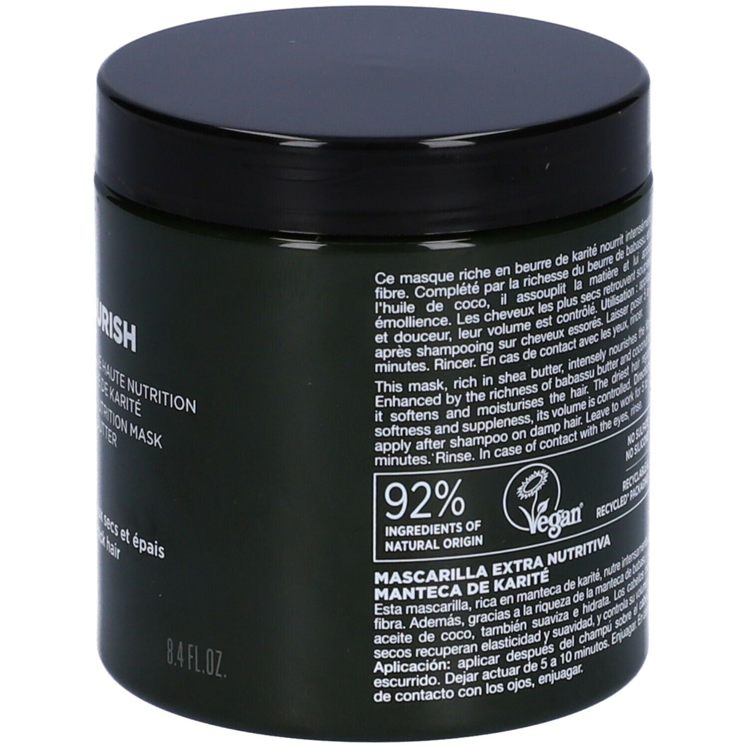 Barattolo verde scuro con coperchio nero. Scritta: NOURISH, Masque Haute Nutrition. 92% ingredienti di origine naturale. Vegano.