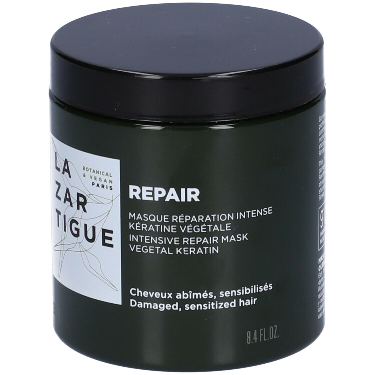 Barattolo verde scuro con coperchio nero. Scritta: LAZARTIGUE, REPAIR, Masque Réparation Intense. 8.4 FL.OZ.