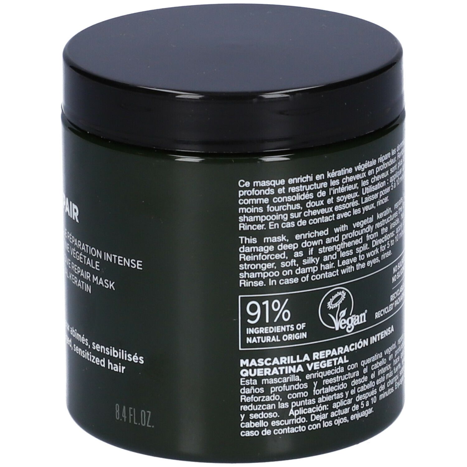Barattolo verde scuro con coperchio nero. Scritta: LAZARTIGUE, REPAIR, Masque Réparation Intense. 8.4 FL.OZ. 91% ingredienti naturali.