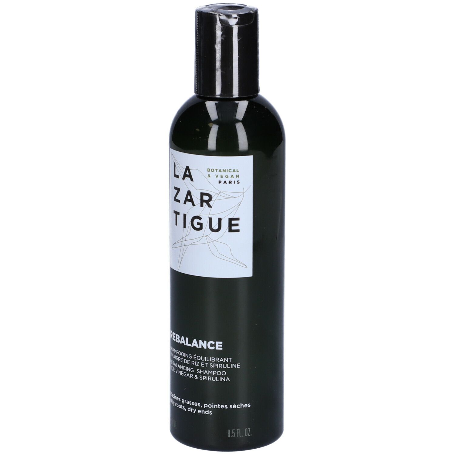 Flacone verde, tappo nero. Scritta LAZARTIGUE REBALANCE Shampoo. Botanico & Vegano Paris.
