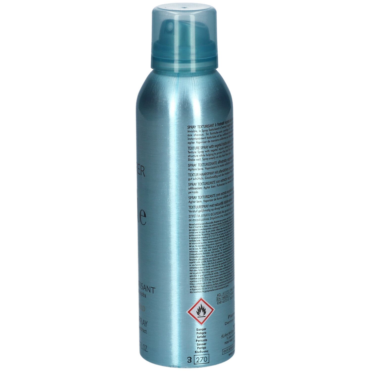 Flacone spray blu turchese. Retro con testo e simboli di avvertimento. Scritta: FURTERER PARIS, Spray Texturisant, Texture Spray. 200 ml.