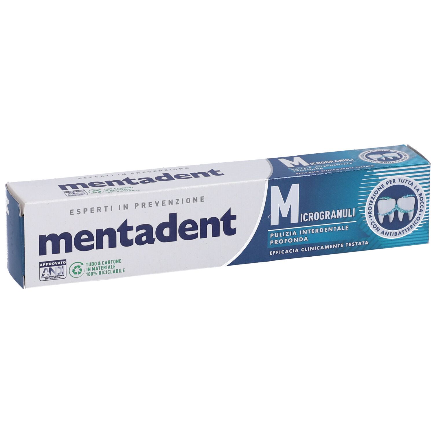Zahncreme-Verpackung. Weiß und blau, mit 'mentadent' und 'Microgranuli'.