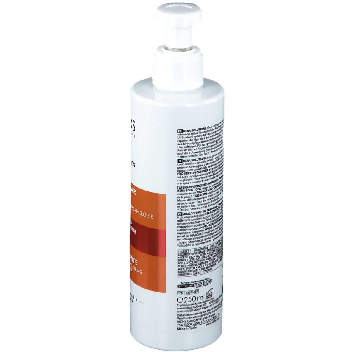 Weiße Flasche mit Pumpverschluss. Aufschrift: Dercos Kera-Solutions, Intensiv-Repair Shampoo. Rückseite mit Text.