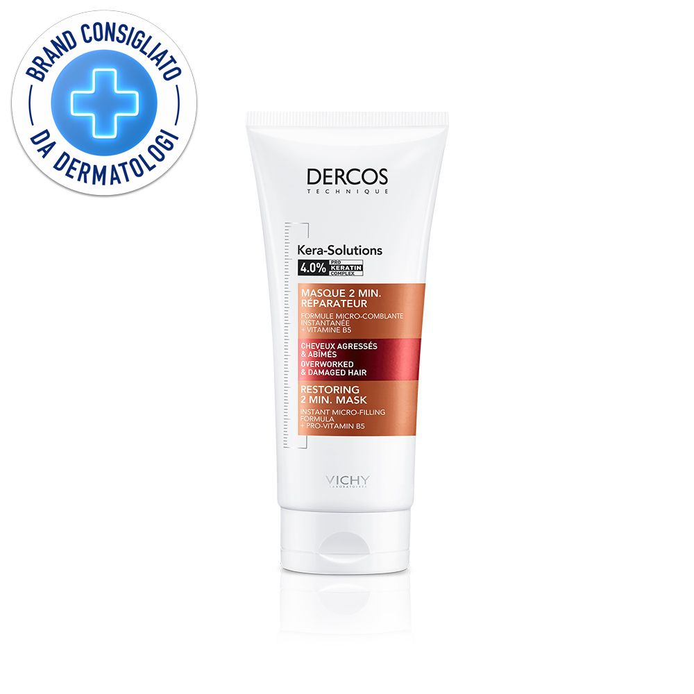 Tubo bianco con prodotto. Scritta: Dercos Technique, Kera-Solutions, 4.0% Cheratina. Logo: Brand Consigliato da Dermatologi.