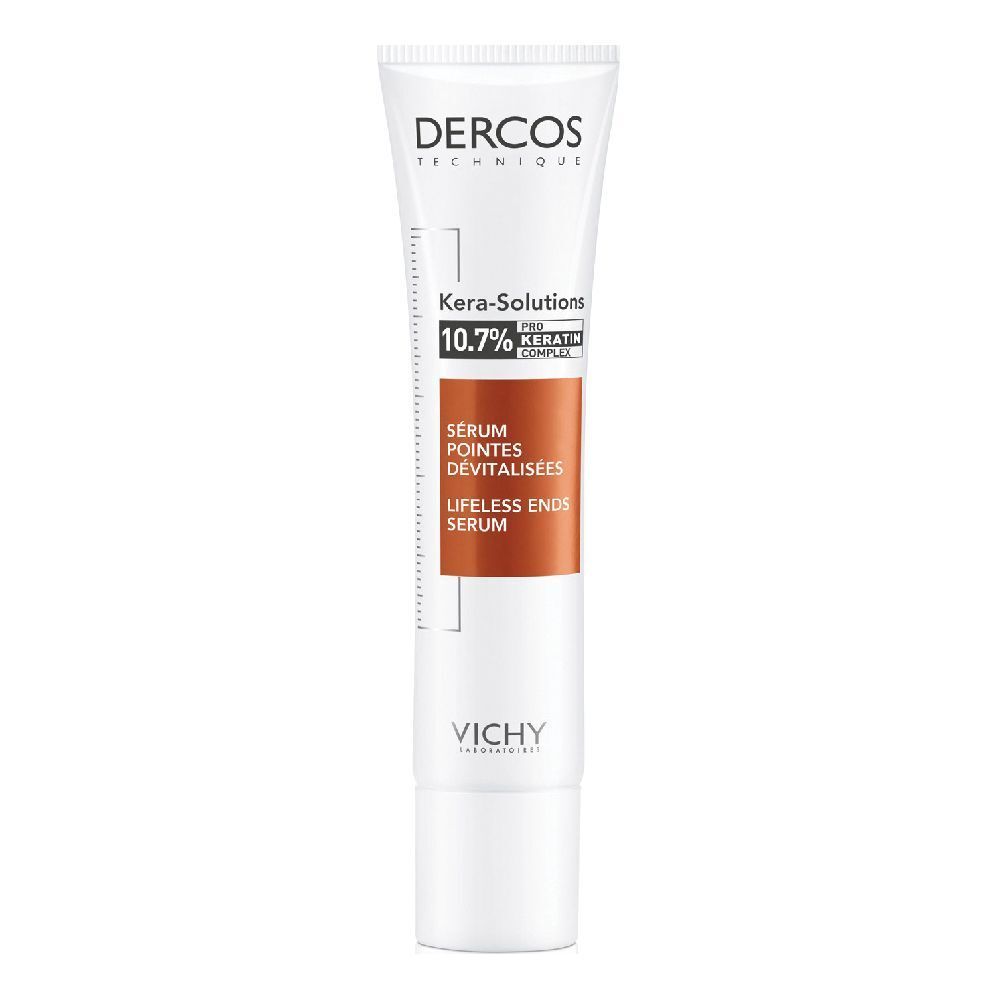 Tube blanc et orange avec logo et nom du produit. Texte: Kera-Solutions, 10.7% Keratin Complex, Sérum Pointes Dévitalisées.