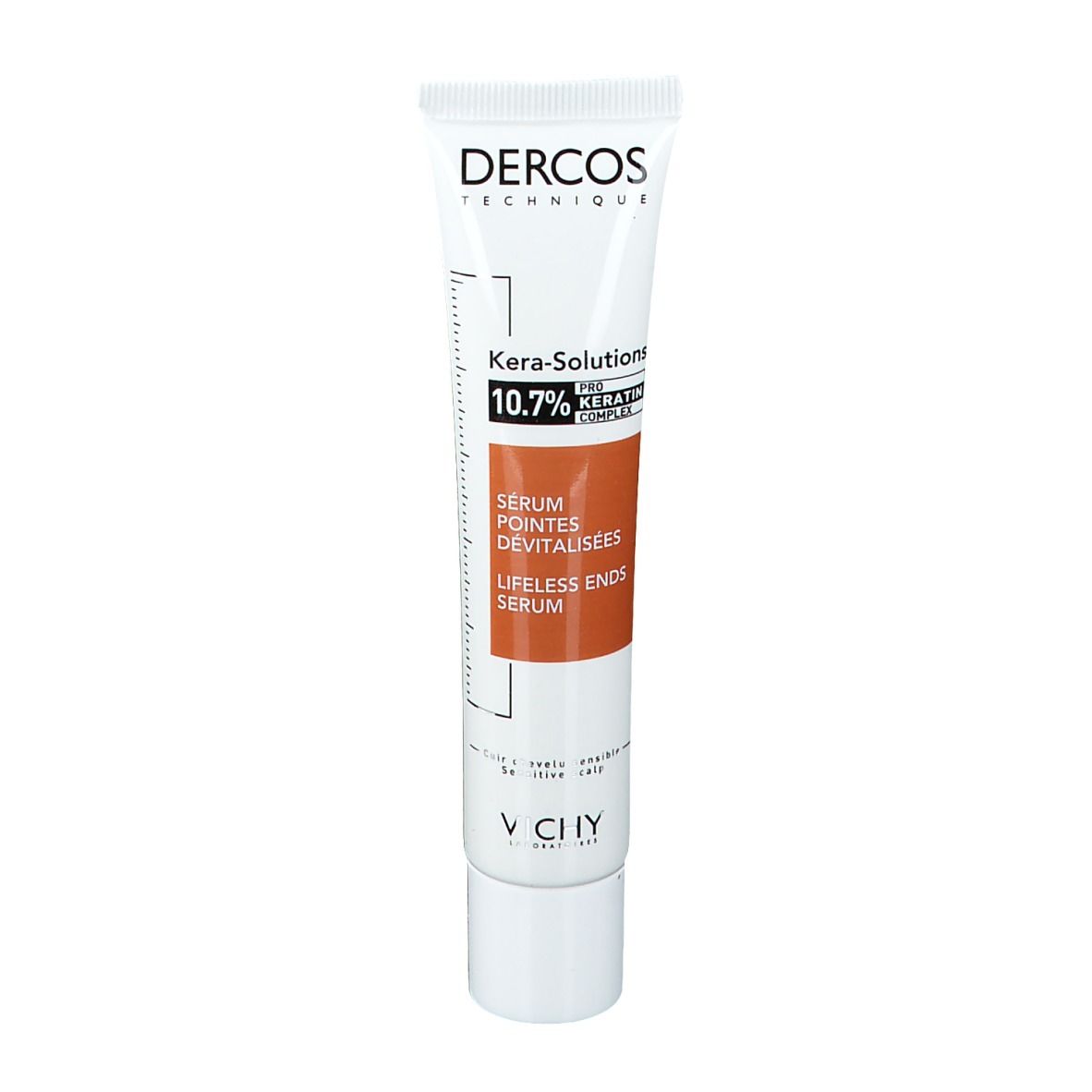 Tube blanc avec partie orange. Texte: Dercos Technique, Kera-Solutions, 10.7% Keratin Complex, Sérum Pointes Dévitalisées.