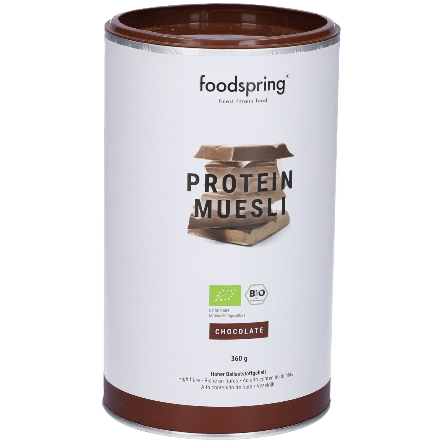 Barattolo cilindrico di Foodspring Protein Muesli Cioccolato. Scritta: Protein Muesli, Cioccolato, 360 g. Marchio biologico.