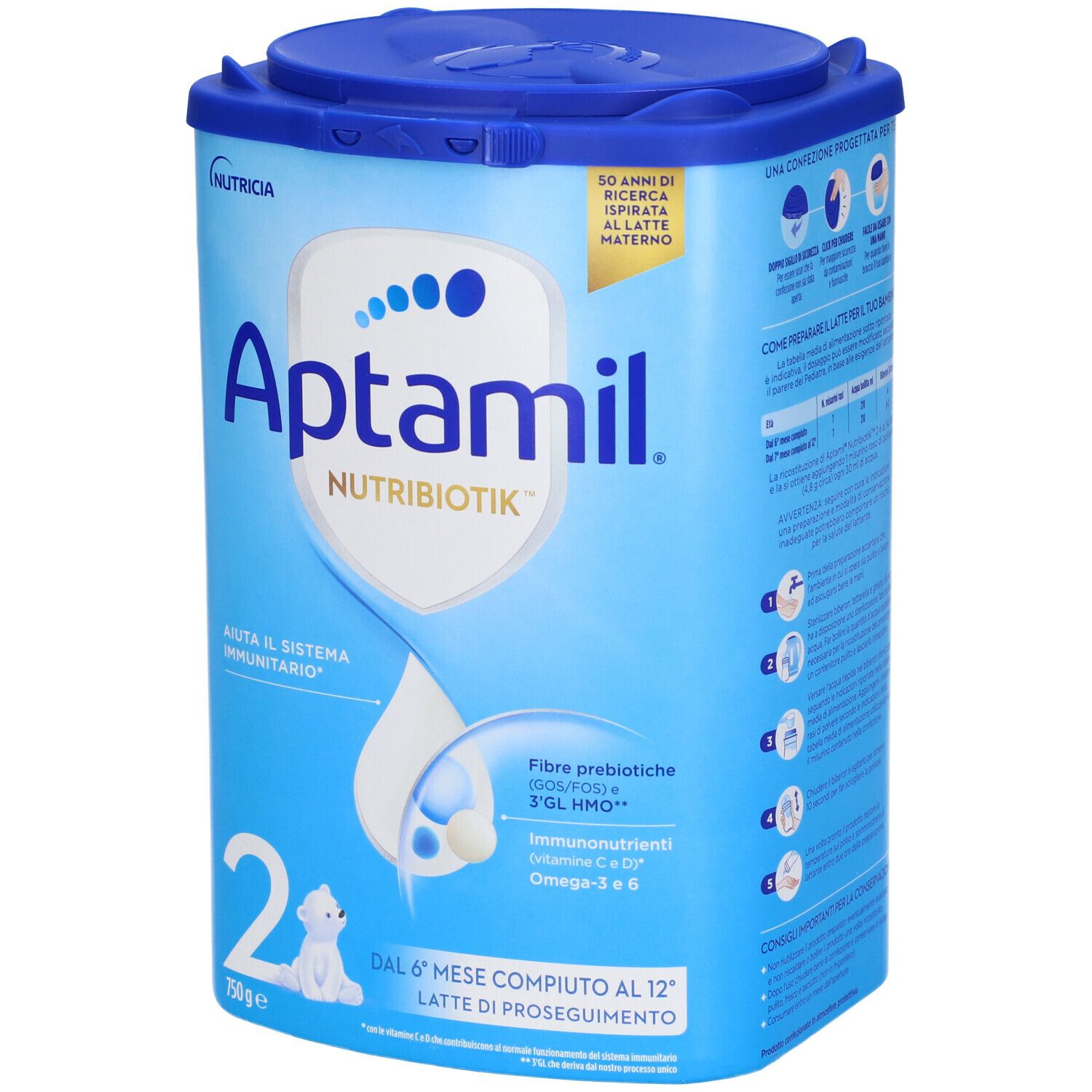 Barattolo blu con coperchio. Scritta Aptamil Nutribiotik 2. Contiene fibre prebiotiche, immunonutrienti e Omega-3 & 6. 750g.