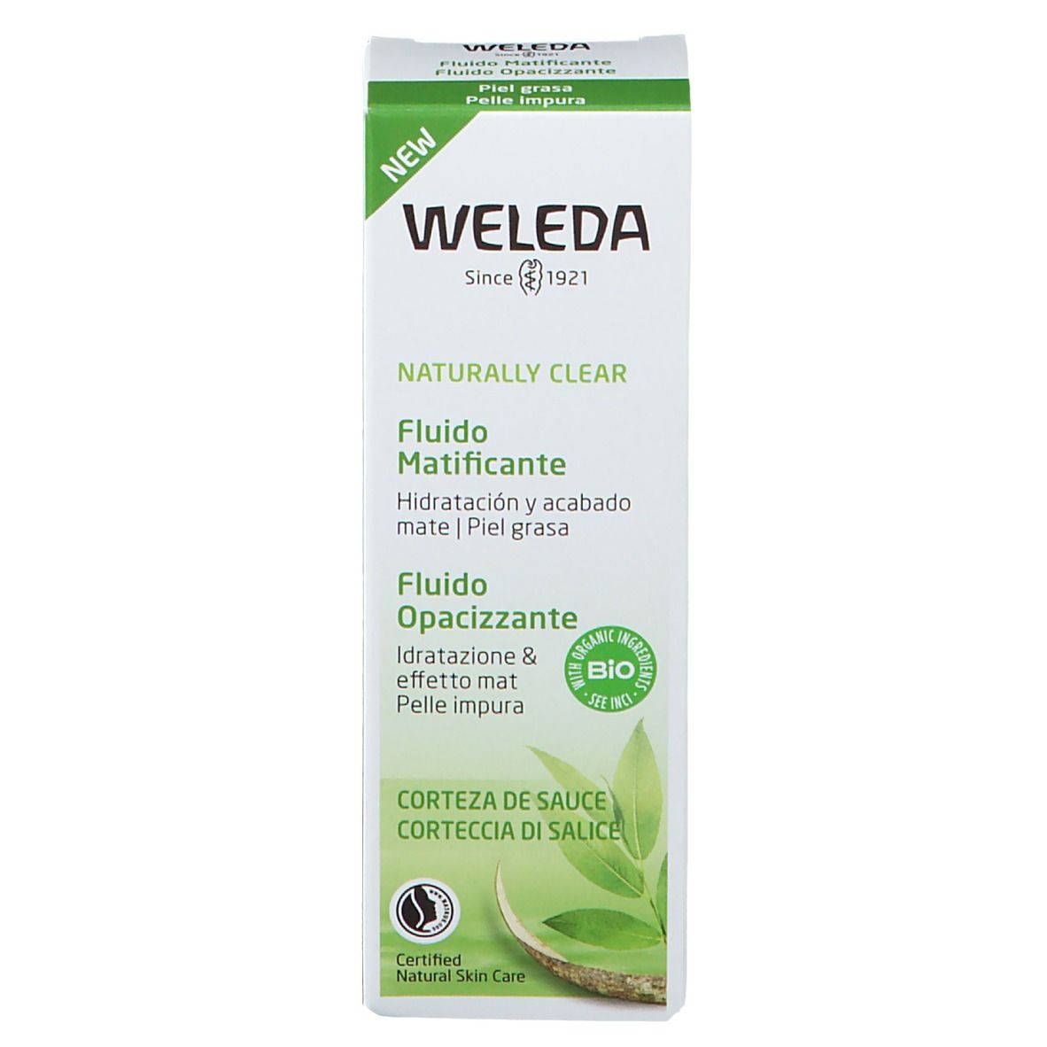 Confezione Weleda. Fluido "Naturally Clear". Scatola verde e bianca con nome e logo del prodotto. Certificazione bio.