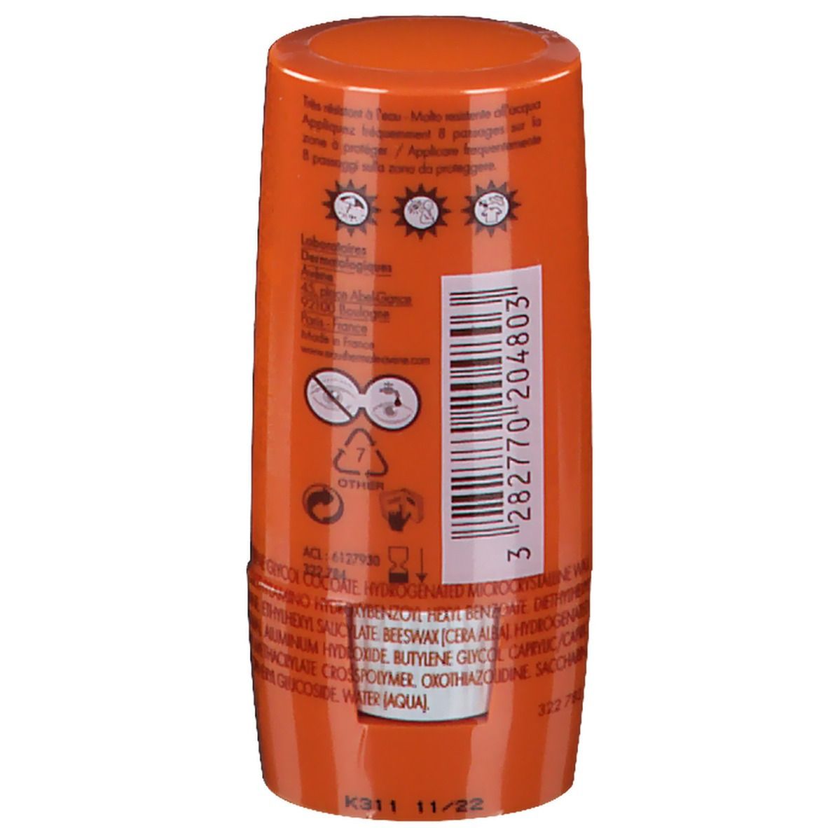 Retro di uno stick arancione. Testo: Laboratoires Avène, istruzioni per l'uso, codice a barre, ingredienti.