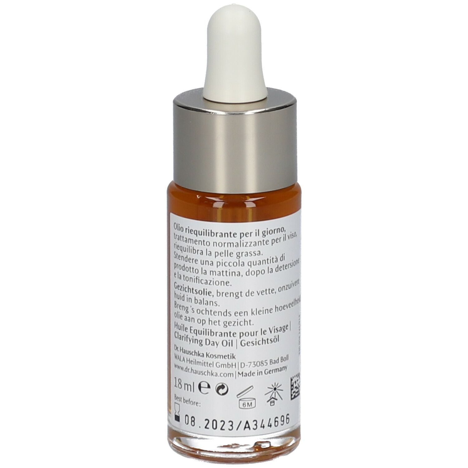 Rückansicht der Gesichtsöl-Flasche. Etikett mit Produktinformationen und Chargennummer.