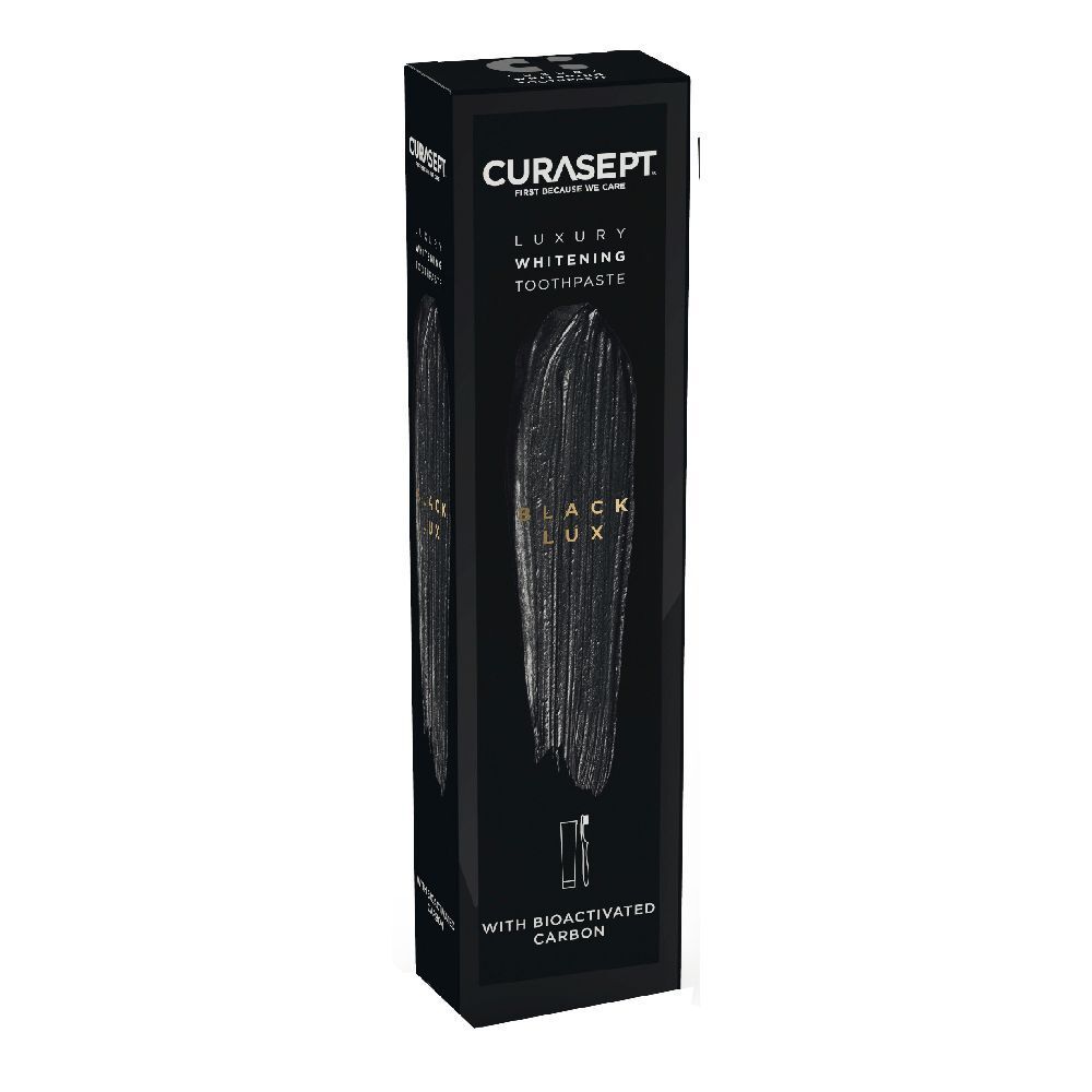 Confezione nera con testo. Visibili: "CURASEPT" e "LUXURY WHITENING TOOTHPASTE". Contiene carbone bioattivato.