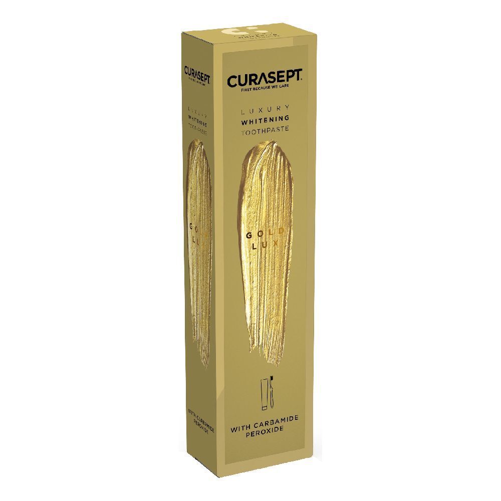 Confezione dentifricio. Scatola dorata con nome prodotto e texture dorata. Contiene perossido di carbammide.