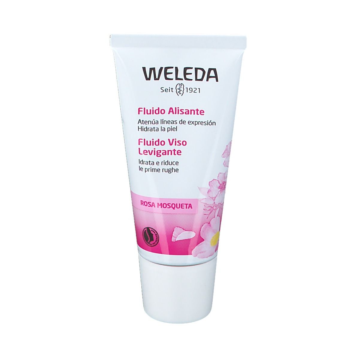 Tubo Weleda. Bianco e rosa. Testo: « Fludio Alisante », « Fludio Viso Levigante », « Rosa Mosqueta ». Certificazione bio.