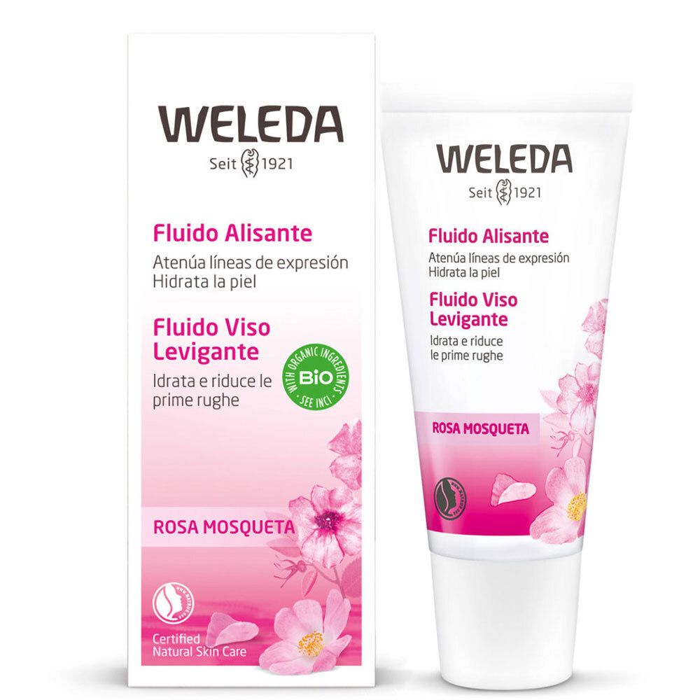 Confezione e tubo Weleda. Rosa e bianco. Testo: « Fludio Alisante », « Fludio Viso Levigante », « Rosa Mosqueta ». Certificazione bio.
