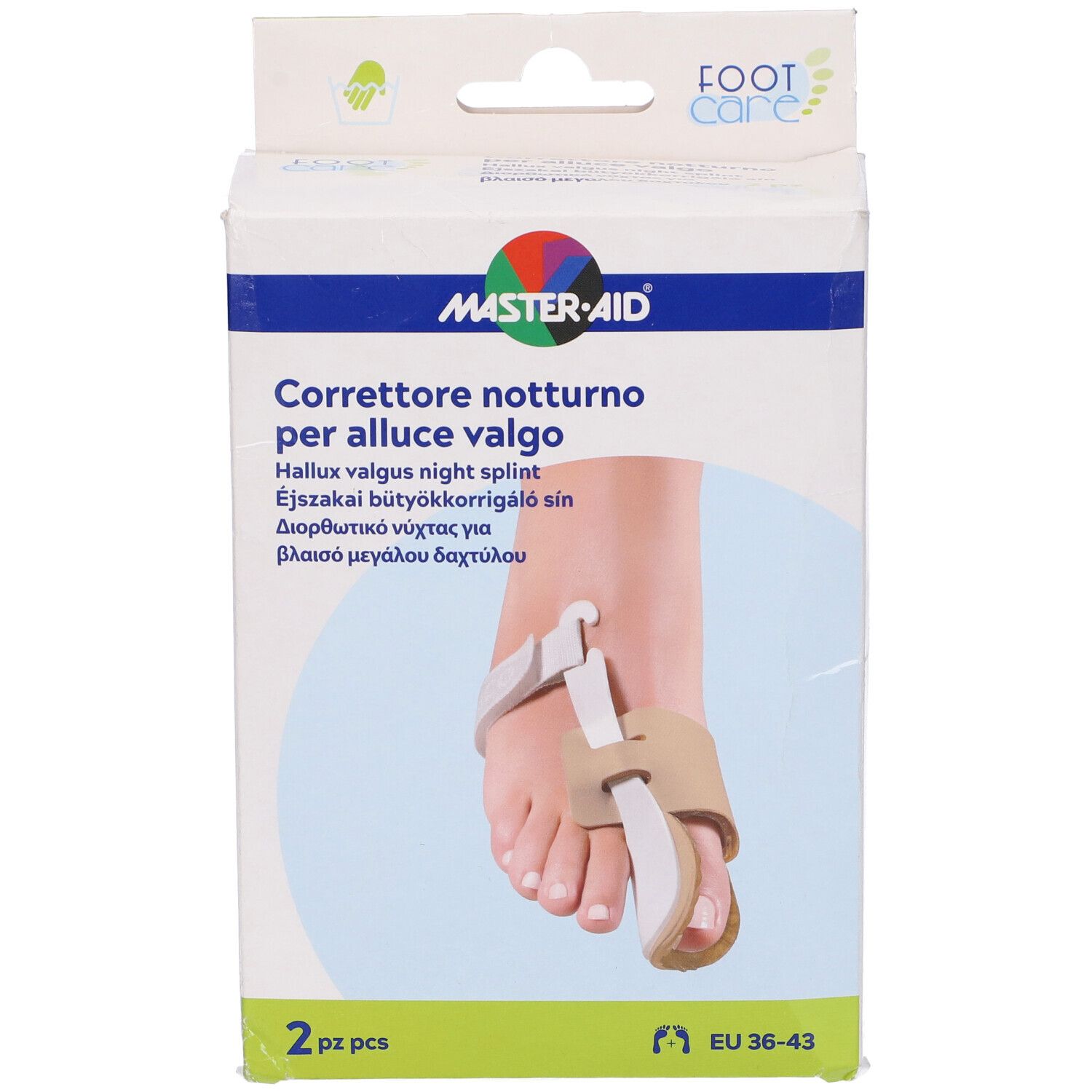 Confezione del prodotto. Sulla scatola è raffigurato un piede con tutore per alluce valgo. Marca: Master-Aid Footcare. Taglia: EU 36-43. 2 pezzi.